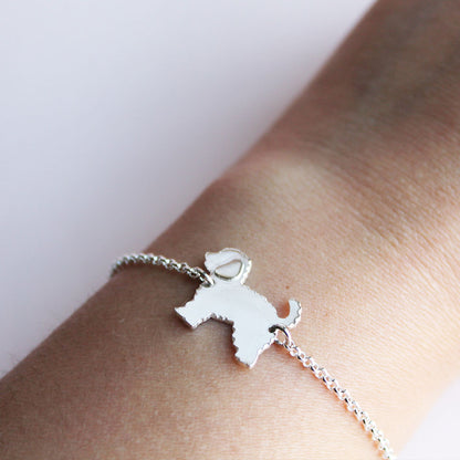 Poodle: Colgante, Pulsera o Collar hecho a mano en plata 950