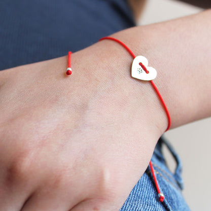 Corazon con huella hilo rojo con nombre